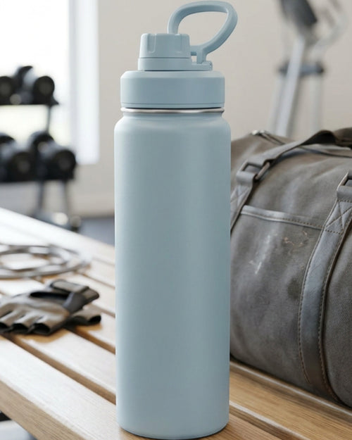 Modne Insulated Bottle Tumbler with Chug Lid and Carry Loop 750 ml Mist Blue - Lifestyle view